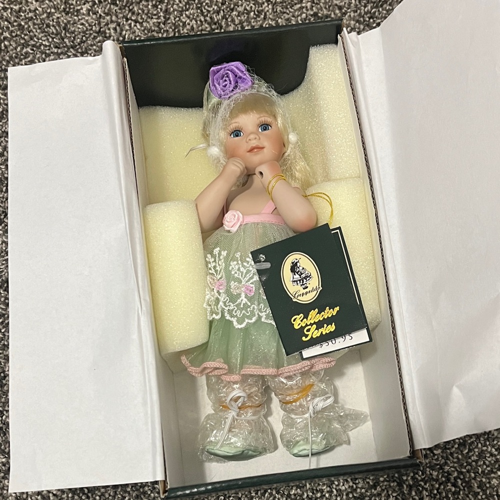 Geppeddo Collector Series Porcelain Doll- Aimee with Green Dress